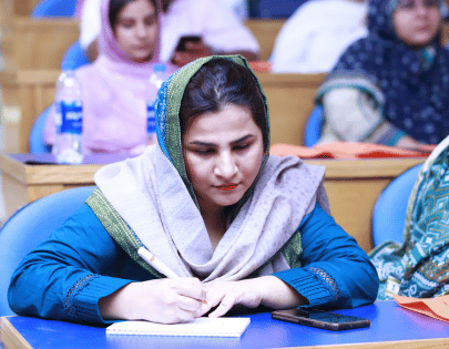 Dr Maryam speaking during DHUS event — photo 13