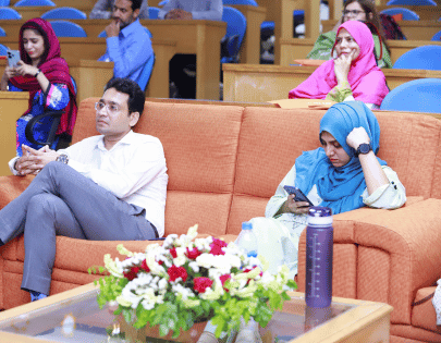 Dr Maryam speaking during DHUS event — photo 18